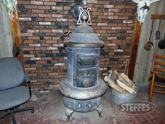 Round oak wood stove
